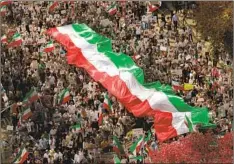  ?? Genaro Molina Los Angeles Times ?? THOUSANDS of Iranian Americans and others march in downtown Los Angeles on Oct. 22 in solidarity with female-led protests in Iran.