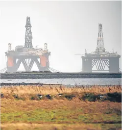  ?? Picture: Getty Images. ?? Rigs standing idle in the Cromarty Firth tell the story of the challenges facing the UK oil and gas industry.