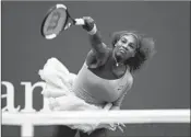  ?? ADAM HUNGER/AP ?? Serena Williams serves in her 6-0, 4-6, 6-3 win over Kaia Kanepi in the fourth round of the U.S. Open on Sunday.