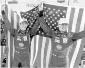  ?? JOHN RAOUX/ASSOCIATED PRESS ?? Ricky Taylor, left, and Jordan Taylor celebrate in Victory Lane after their team won the Rolex 24 in Daytona.