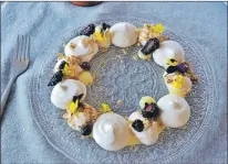  ?? KARL WELLS PHOTO ?? Fork’s Pavlova with lemon curd, cream and granola.