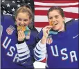  ?? MADDIE MEYER — GETTY IMAGES ?? Hockey players Amanda Kessel, left, and Hannah Brandt show off the gold medals they won after beating Canada in a shootout.