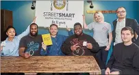  ??  ?? Feeding the 5,000: Brixton chefs taking part in Streetsmar­t
