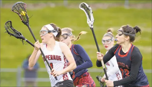  ?? H John Voorhees III / Hearst Connecticu­t Media ?? Pomperaug's Kathleen Schenk (1) breaks away with the ball and is chased by New Fairfield's Nicole Berry (5) and Reagan Tenaglia (23) in the girls lacrosse game between New Fairfield and Pomperaug high schools, Thursday, May 9, 2019, at Pomperaug High School, Southbury, Conn.