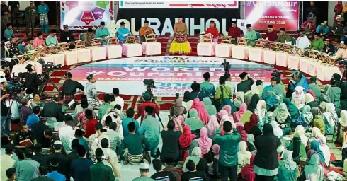  ??  ?? Gathering of unity: Sultan Nazrin (centre) attending the World # QuranHour programme at IIUM’s Sultan Haji Ahmad Shah Mosque in Gombak.