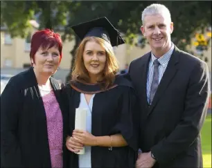  ??  ?? Siobhan Merrigan from New Ross who graduated Graduated B.A. (Hons) in applied Social Studies in Social Care, with her parents Martina and Tony.