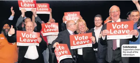  ??  ?? Celebratio­n Supporters cheer the result of the referendum