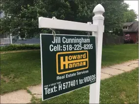  ?? FILE PHOTO ?? A real estate sign is posted on a property in Saratoga Springs.