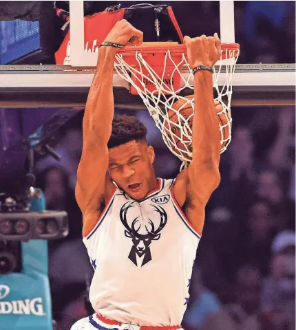  ?? BOB DONNAN/USA TODAY ?? Giannis Antetokoun­mpo of the Milwaukee Bucks had 38 points and 11 rebounds Sunday night in the NBA All-Star Game, but his team fell short against Team LeBron, 178-164, in Charlotte.