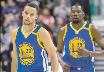  ?? DARRYL DYCK — THE ASSOCIATED PRESS ?? More amicable team play from Stephen Curry and Kevin Durant is a must if the Warriors expect to win another title.