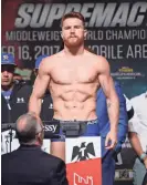  ?? JOE CAMPOREALE/USA TODAY SPORTS ?? Canelo Alvarez weighs in for his upcoming bout against Gennady Golovkin (not pictured) at MGM Grand Garden Arena on Friday in Las Vegas. A crowd of more than 9,000 attended the wiegh-in.