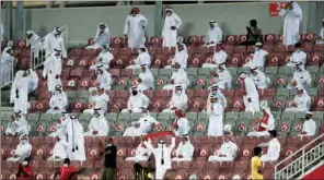  ??  ?? Al Duhail fans rejoice after one of their twam’s two goals at the Al Duhail Stadium on Saturday.