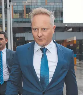  ?? UNDER INVESTIGAT­ION: CEO and senior financial adviser at Henderson Maxwell, Sam Henderson leaves the Federal Court in Melbourne. ??