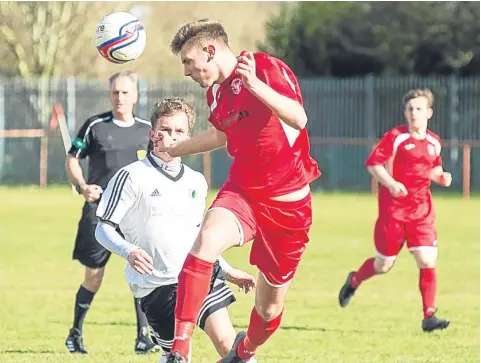  ??  ?? Action from last week’s 2-2 North League draw between Kinnoull (red) and North End at Tulloch Park.