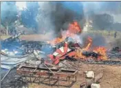  ?? PTI ?? The wreckage of a Surya Kiran aircraft after two of them collided mid-air during an air show near Bengaluru on Tuesday.