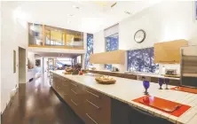  ??  ?? With features like this massive kitchen/dining room, owner Raoul Malak says his mansion would better suit a family with three or four children.