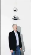  ??  ?? Chris Larsen, a 59-year-old tech industry veteran who made a fortune in cryptocurr­ency, has paid nearly $4 million to install security cameras on private property with the permission of the owners.