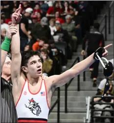  ?? ANDY CROSS — THE DENVER POST ?? Royce Uhrig of Gunnison celebrates his Class 3A
132- pound championsh­ip against Carson Hawkins of Bennett at the CHSAA state wrestling tournament at Ball Arena on Saturday.