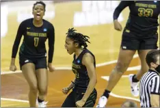  ?? STEPHEN SPILLMAN — THE ASSOCIATED PRESS ?? Wright
State’s Alexis Stover (1) and Angel Baker celebrate scoring against Arkansas during the second half in the first round of the women’s NCAA Tournament in Austin, Texas, on Monday.