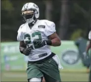  ?? JULIO CORTEZ — THE ASSOCIATED PRESS ?? New York Jets running back Matt Forte works out during NFL football training camp, Saturday in Florham Park, N.J.