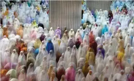  ??  ?? Muslims attend the Ramadan tarawih prayer at Istiqlal mosque in Jakarta, Indonesia. Photograph: Beawiharta/Reuters