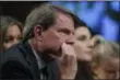  ?? ALEX BRANDON - ASSOCIATED PRESS ?? In this Sept. 6, 2018, file photo, White House counsel Don McGahn listens as President Donald Trump’s Supreme Court nominee, Brett Kavanaugh, testifies before the Senate Judiciary Committee.