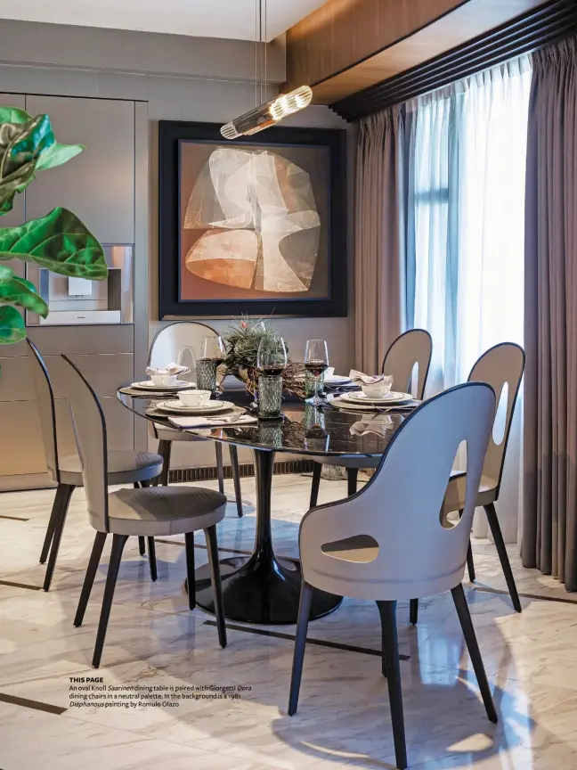  ??  ?? THIS PAGE
An oval Knoll Saarinen dining table is paired with Giorgetti Dora dining chairs in a neutral palette. In the background is a 1981
Diaphanous painting by Romulo Olazo