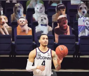  ?? David Butler II / Associated Press ?? UConn’s Tyrese Martin inbounds the ball during Tuesday’s game against Butler.