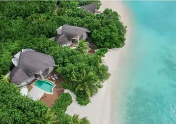  ??  ?? Aerial view of a Beach Pool Villa.