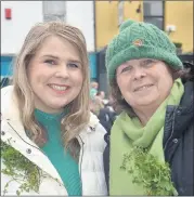  ?? Ahern) (Pic: John ?? Margaret Anne and Kathleen Fitzgerald, from Anglesboro, who grow their own shamrock, were in Mitchelsto­wn for last Sunday’s parade.