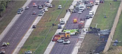  ?? ANDREW WEST/FORT MYERS NEWS-PRESS ?? Five people were on board the private jet when it crashed Friday along Interstate 75 in Florida’s Collier County, according to the Florida Highway Patrol.