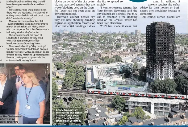  ??  ?? Prime Minister Theresa May leaves the Chelsea and Westminste­r Hospital in London after visiting people who were injured in the Grenfell Tower fire A tube train passes the charred skeleton of Grenfell Tower, seen from a neighbouri­ng tower block yesterday