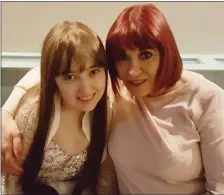  ??  ?? 16-year-old Tina McElligott pictured with her mother Mags, is 40 days seizure free.