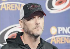  ?? Gerry Broome / Associated Press ?? Carolina Hurricanes owner Tom Dundon, seen here in 2018 in Raleigh, N.C., is investing $250 million in the Alliance of American Football.