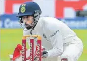  ?? AFP ?? India wicketkeep­er Wriddhiman Saha was impeccable in the Colombo Test, effecting several key dismissals.