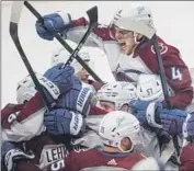  ?? Amber Bracken Associated Press ?? COLORADO players react after scoring the gamewinner on Edmonton en route to Stanley Cup Final.