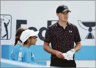  ?? Gregory Shamus / Getty Images ?? Jordan Spieth talks with kids on the tee box during the pro-am at the AT&T Byron Nelson on Wednesday.