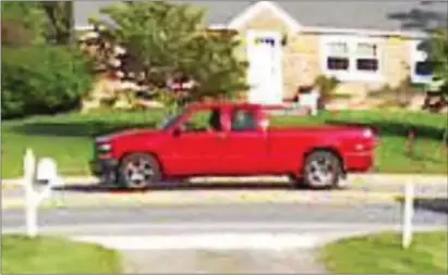 ?? SURVEILLAN­CE IMAGE ?? The surveillan­ce image of the red pickup truck at the center of a fatal road-rage incident in Chester County.