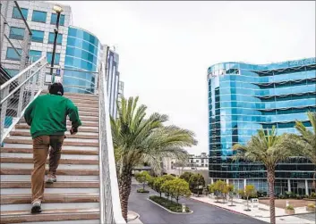  ?? Ariana Drehsler Bloomberg ?? SILVERGATE BANK has been under increasing pressure amid several high-profile bankruptci­es in the cryptocurr­ency industry, including FTX. Above, the bank’s headquarte­rs in La Jolla is seen on the right.