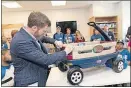  ?? [NATIONWIDE CHILDREN’S HOSPITAL] ?? Dale Earnhardt Jr. has been helping Nationwide Children’s Hospital since 2015, when this photo was taken. He now has establishe­d a fund to help with injury rehabilita­tion, research and prevention.