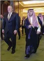  ?? LEAH MILLIS/VIA AP ?? U.S. Secretary of State Mike Pompeo (left) walks with Saudi Foreign Minister Adel al-Jubeir in Riyadh, Saudi Arabia.