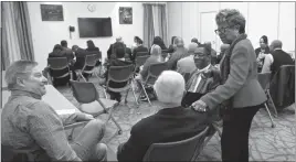  ?? STAFF PHOTO BY DARWIN WEIGEL ?? Doris Cammack-Spencer talks with, from left, Brian Klaas of Nanjemoy, a member of the Charles County Chamber of Commerce; Vince Hungerford of Indian Head, co-chairman of the Charles’ chamber’s Military Alliance Committee (MAC); and John Huggins of...