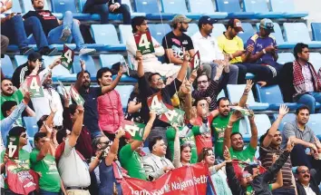  ?? Ahmed Ramzan/ Gulf News Archives ?? Crowd watch a match between Karachi Kings and Lahore Qalandars at Dubai Sports City. The first edition of ECB’s T20 league is to be held between December 19 and January 11 in UAE.