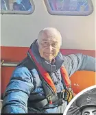  ?? ?? Tony on a fishing trawler as he explores the work done on the Thames at night