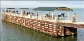  ?? CHAD FELTON — THE NEWS-HERALD ?? The 200-foot pier at Painesvill­e Township Park was officially opened in October.