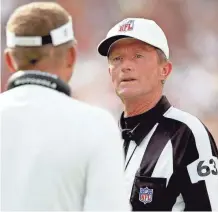  ?? MATTHEW STOCKMAN / MILWAUKEE JOURNAL SENTINEL ?? Bill Carollo oversees the officials for three NCAA football conference­s.