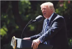  ?? AP PHOTO EVAN VUCCI ?? President Donald Trump speaks during a presentati­on ceremony of the Commanderi­n-Chief trophy to the Air Force Academy football team, May 2, in the Rose Garden of the White House. During the ceremony, the president touted the budget deal forged to fund...