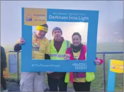  ?? Fermoy) (Photo: DiL ?? Darkness into Light committee member Martin Joyce, pictured with P.J. O’Leary and Liz Cotter who volunteere­d at the event.