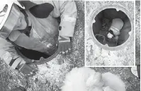  ??  ?? MENYELAMAT: Seorang anggota bomba memasuki lubang sistem saluran air dan menyerahka­n anjing yang berjaya diselamatk­an kepada pemiliknya.