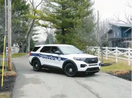  ?? MICHAEL CONROY/AP ?? A police vehicle stands Friday in the vicinity of former Vice President Mike Pence’s Indiana home. The FBI searched the home as part of a classified records probe.